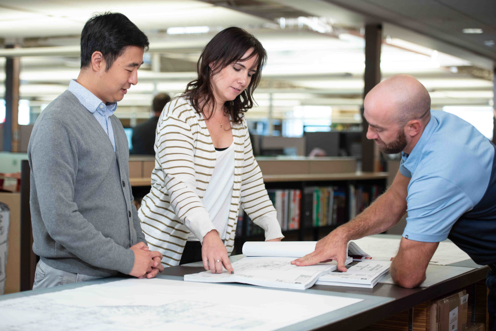 group of people discussing architecture